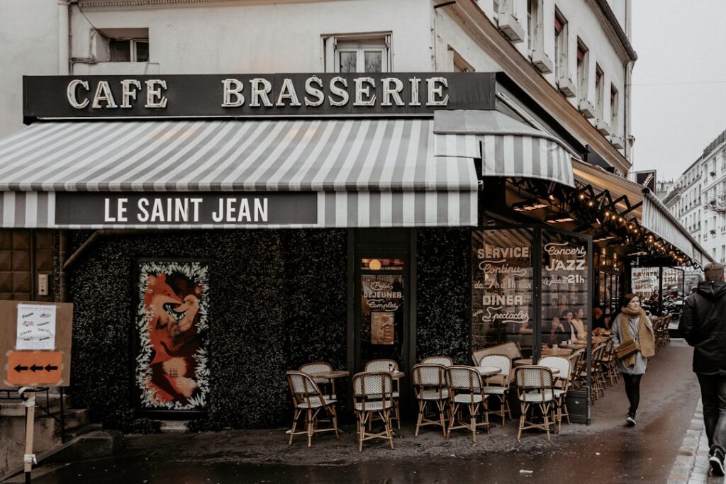 black and white restaurant with chairs and tables